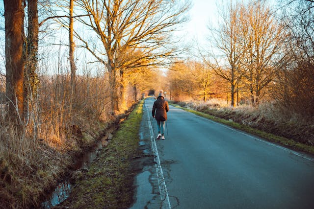 Person exercising outdoors in winter light